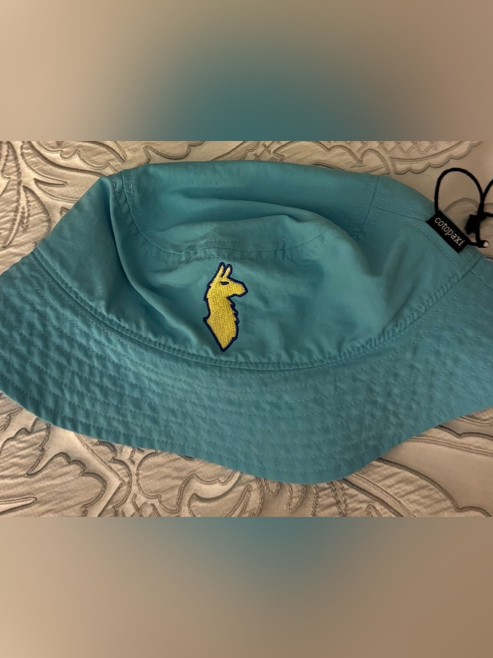 Bucket Hat with Cotopaxi label